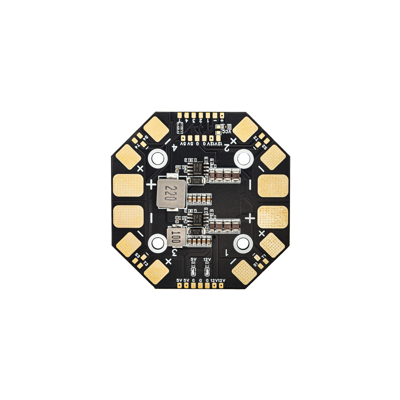 Octagonal power distribution board with solder pads and inductors, top-down close-up