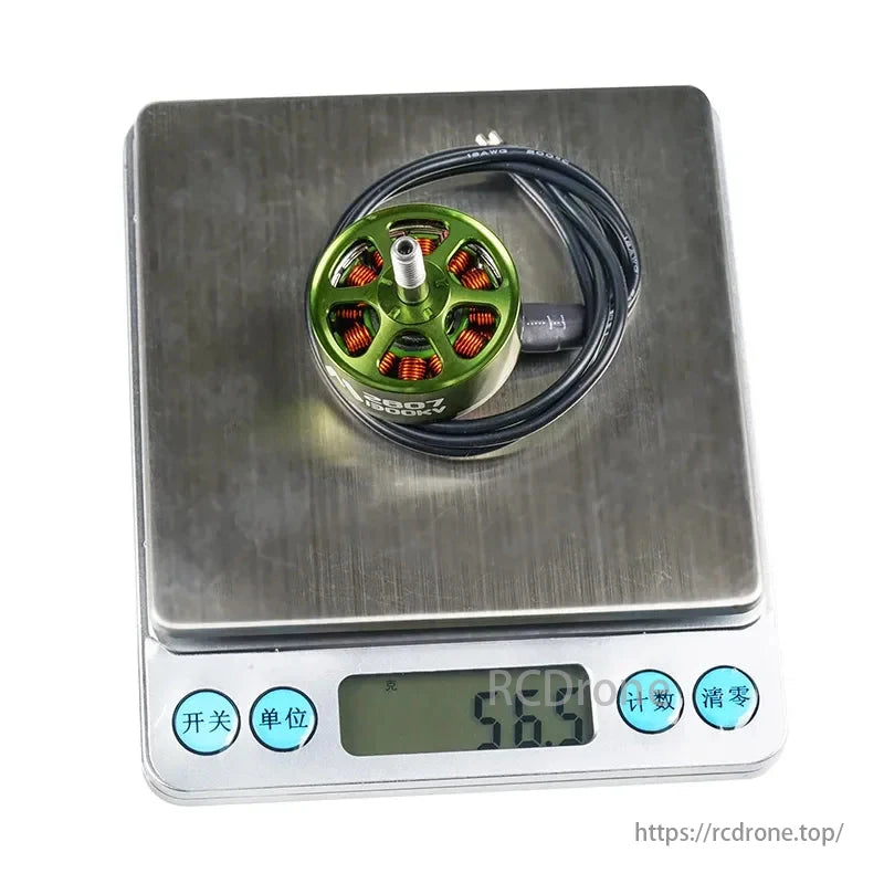 FlashHobby Mars M2807 1300KV brushless motors for 7-inch FPV drones, with 5mm shaft, shown on a scale.