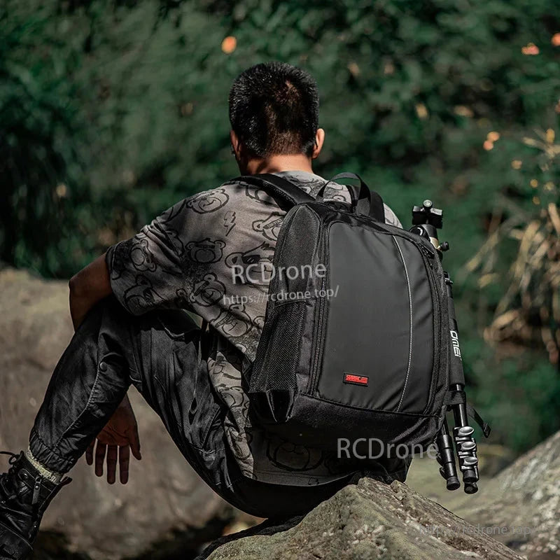 Waterproof backpack for DJI Avata FPV, fits goggles, remote, tripod mount, and includes rain cover for outdoor protection.