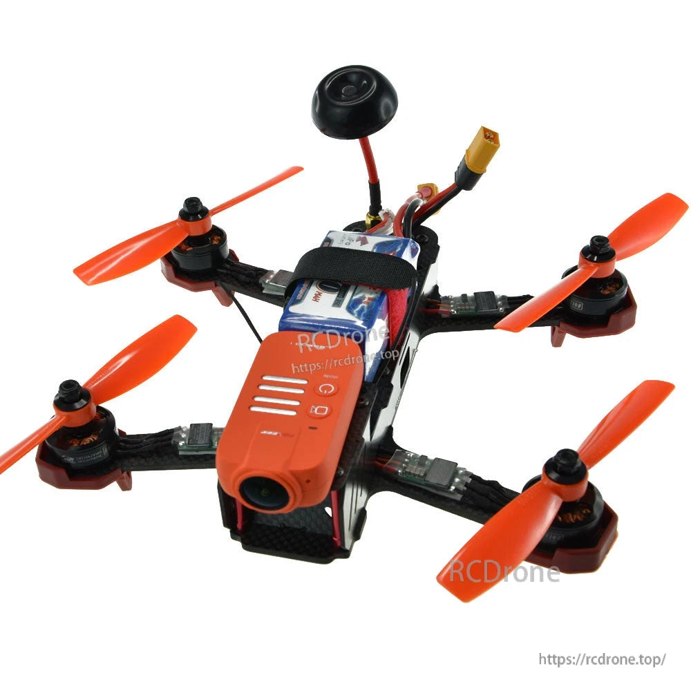Orange bullnose bi-blade 5-inch drone propellers mounted on a racing quadcopter
