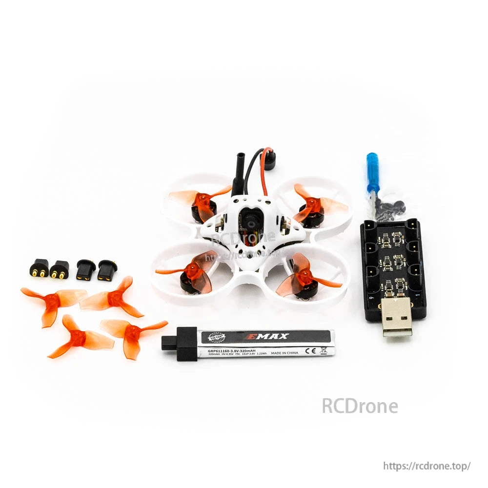 kit contents: micro drone, spare props, 1S battery, and USB charger board