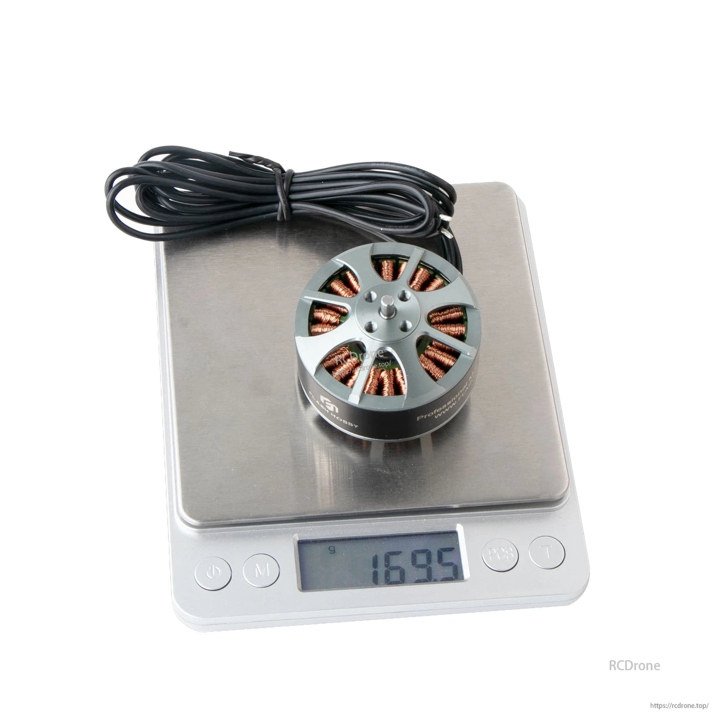 Flashhobby 4114 brushless DC motor with long lead wires on a digital scale showing 169.5 g