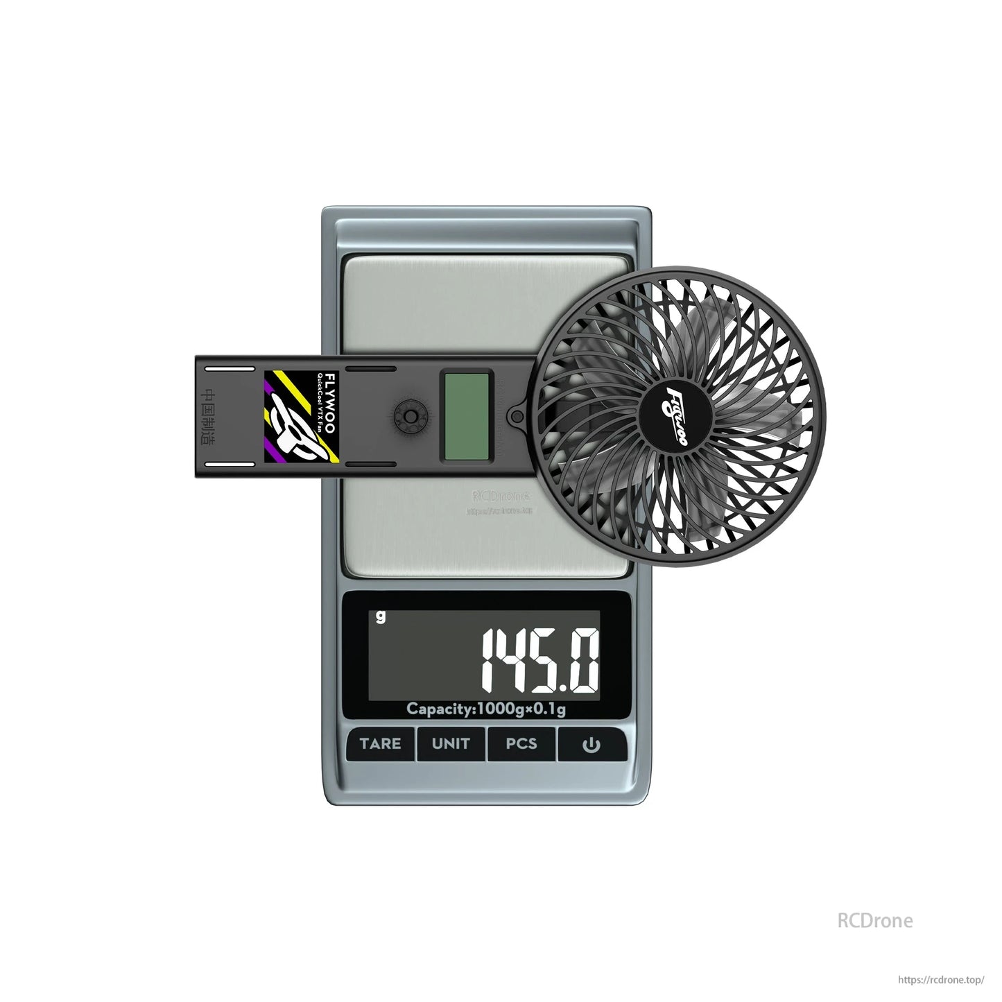 Flywoo QuickCool VTX portable fan unit on a digital scale, showing 145.0 g weight and round cooling grille