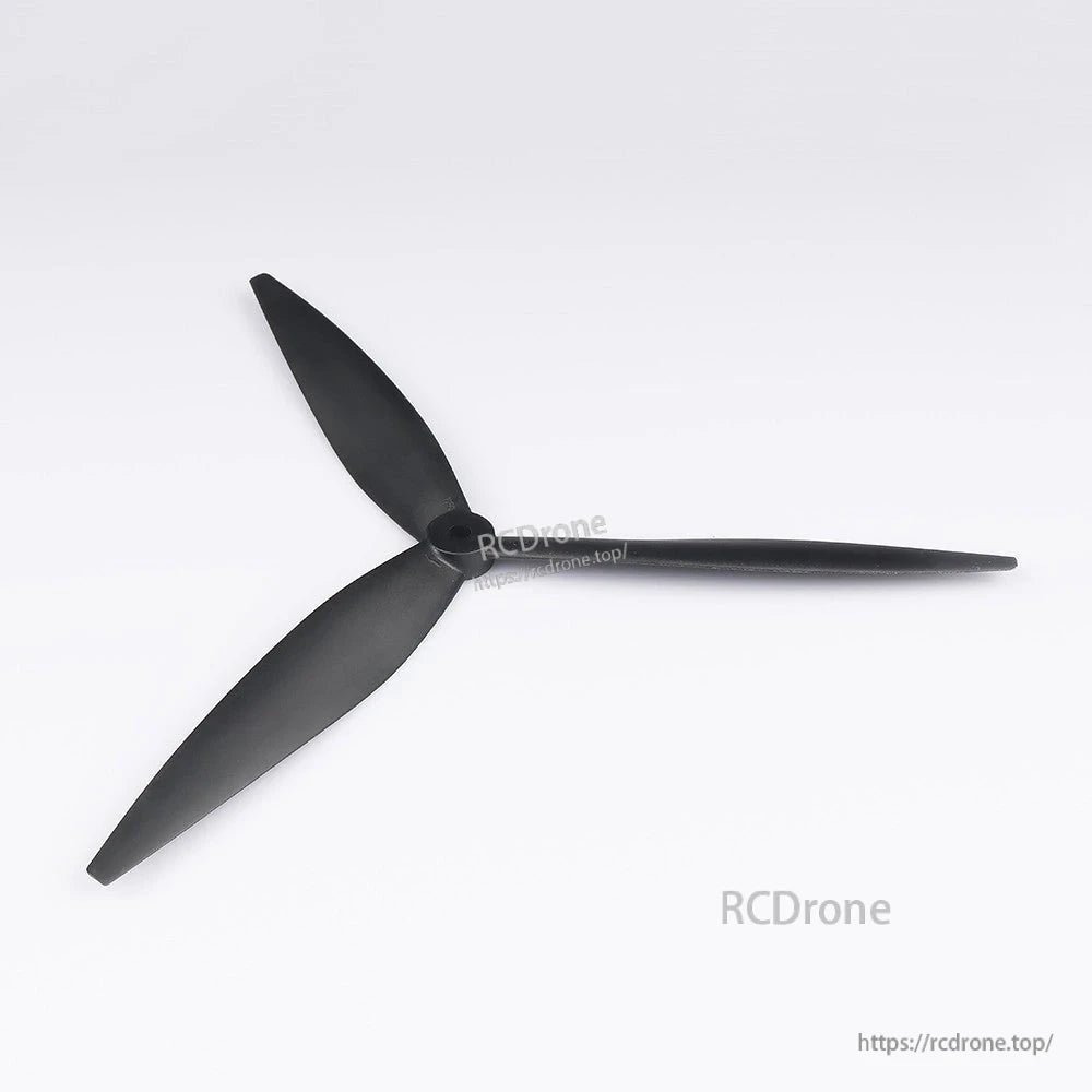 Black Foxeer Cyclone T1050 tri-blade drone propeller with central mounting hub on a white background