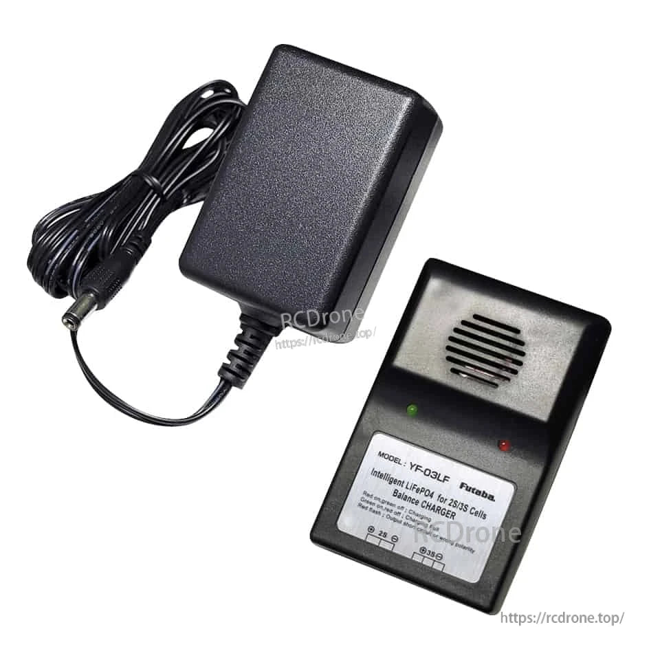 LiFe battery charger unit with speaker grille and red/green status LEDs, shown with plugged-in power adapter