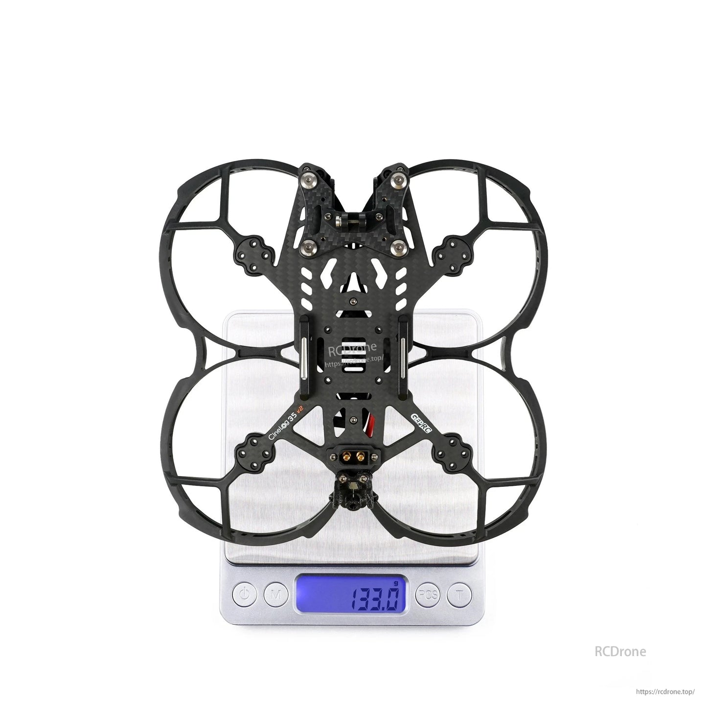 GEPRC GEP-CL35 V2 FPV Frame, GEPRC CineLog35 V2 3.5-inch FPV frame with prop guards, shown on a digital scale reading 133.0 g