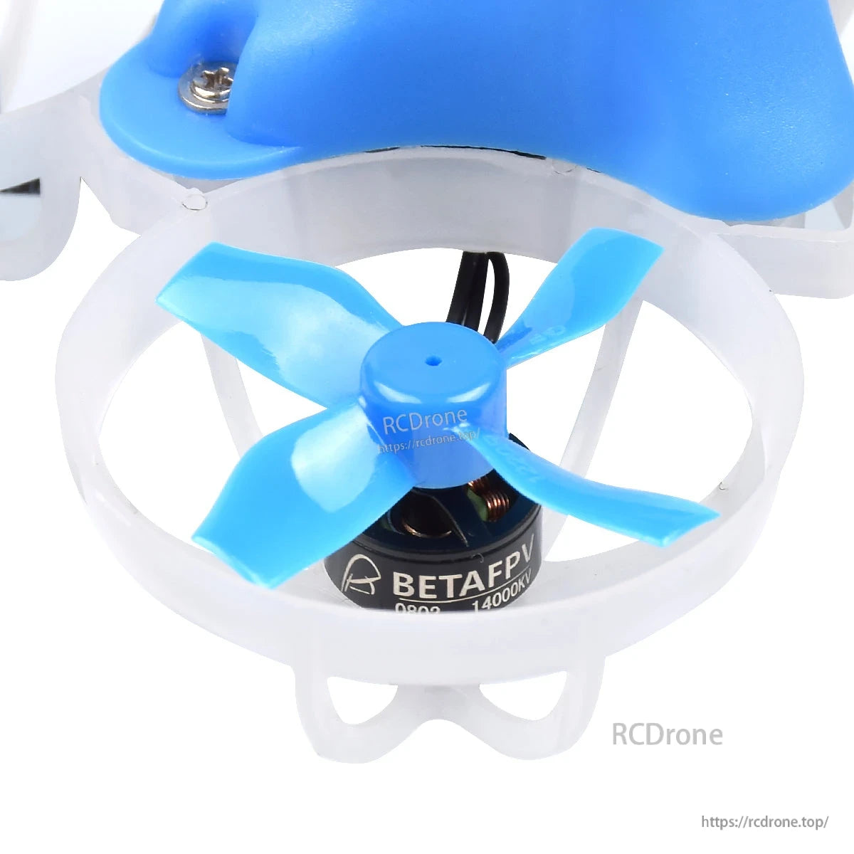Blue 4-blade micro whoop prop installed on ducted whoop drone frame close-up