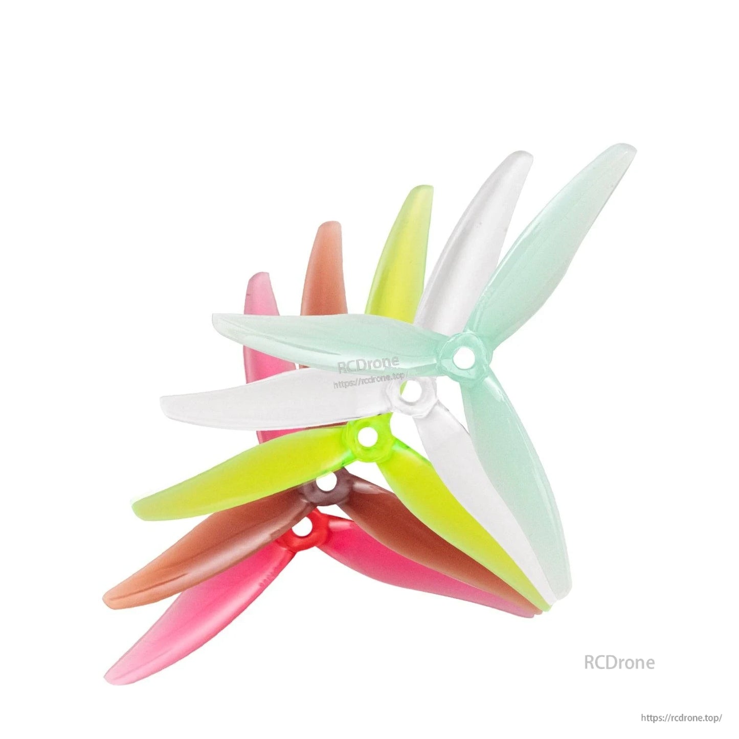 Stacked 3-blade drone propellers in mixed colors showing hub profiles and blade overlap