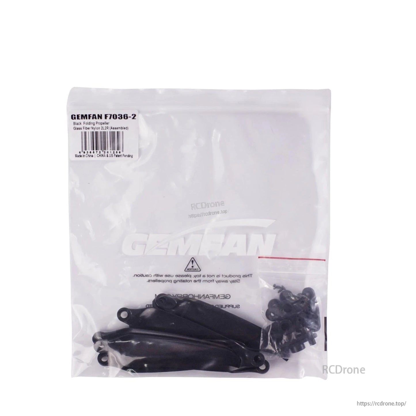 Sealed retail bag with GEMFAN F7036-2 label and propellers visible inside