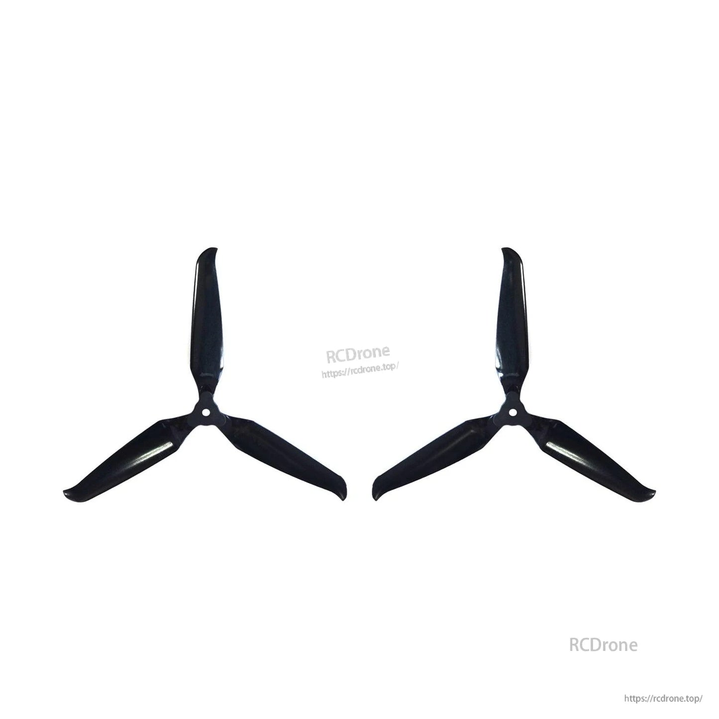 Two assembled 3-blade propellers spaced apart on white background, black finish