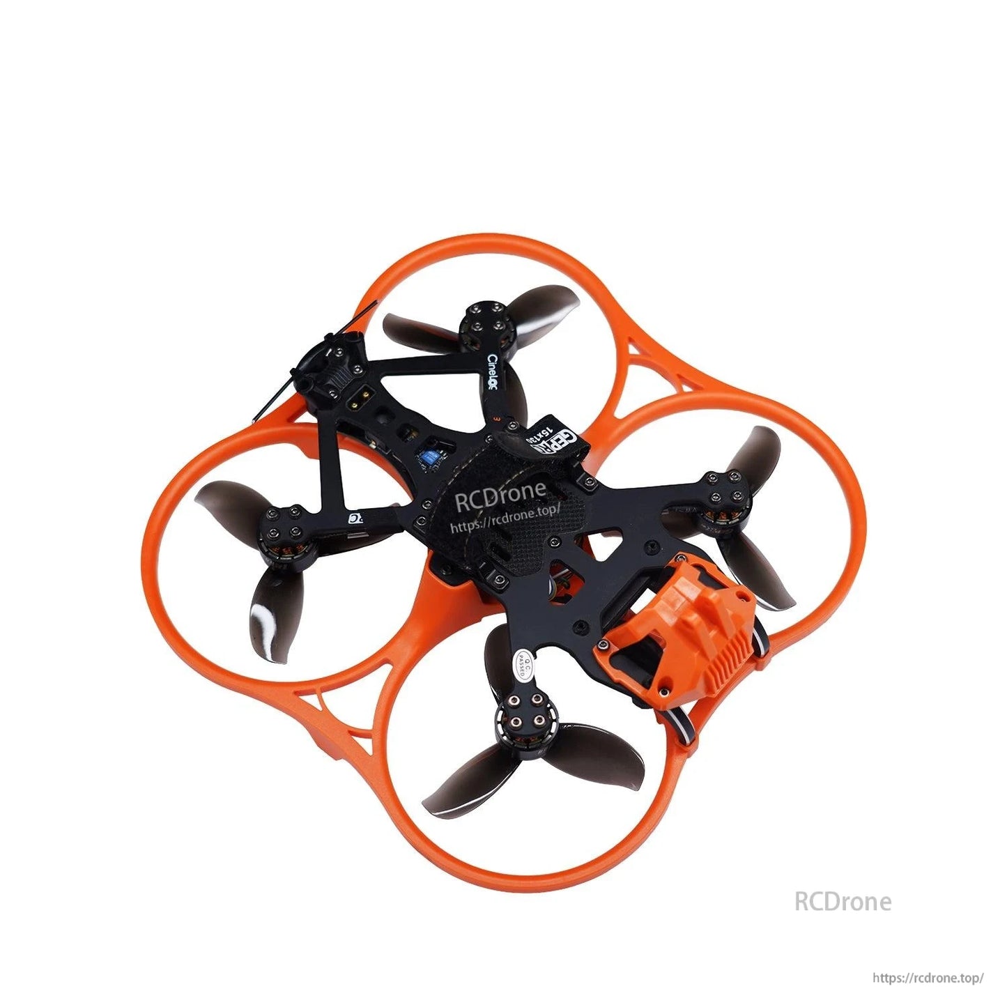 Cinewhoop drone with orange ducts using black tri-blade props, top view