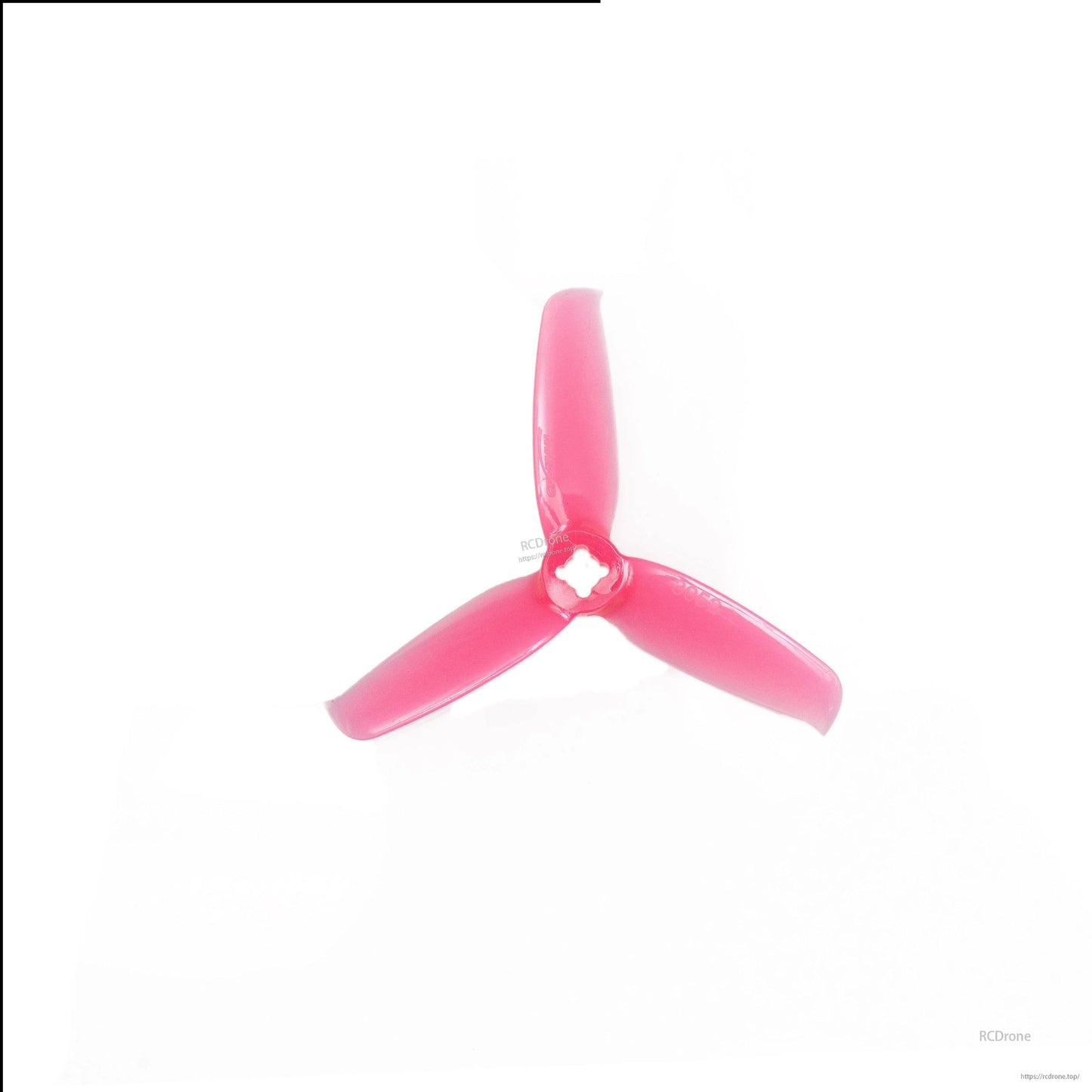 Pink 3-blade drone propeller, close-up top view