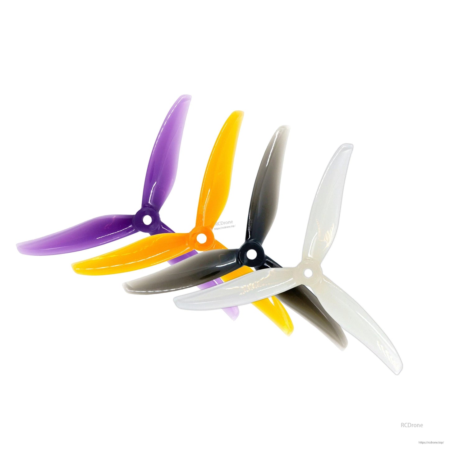 Gemfan Freestyle 5226 3-blade propellers shown together in purple, orange, gray, and clear
