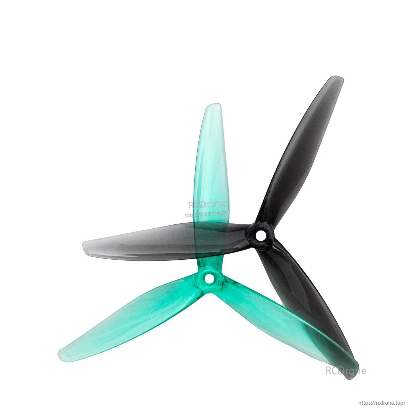 Clear green and clear gray 3-blade propellers overlapped to compare colors and hub style