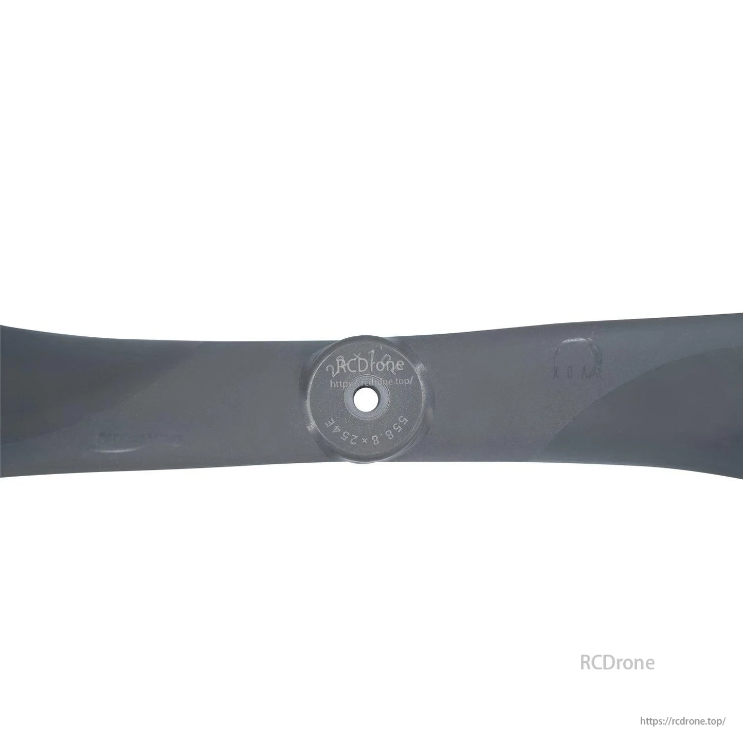 Hub close-up showing center bore and molded size markings on the propeller