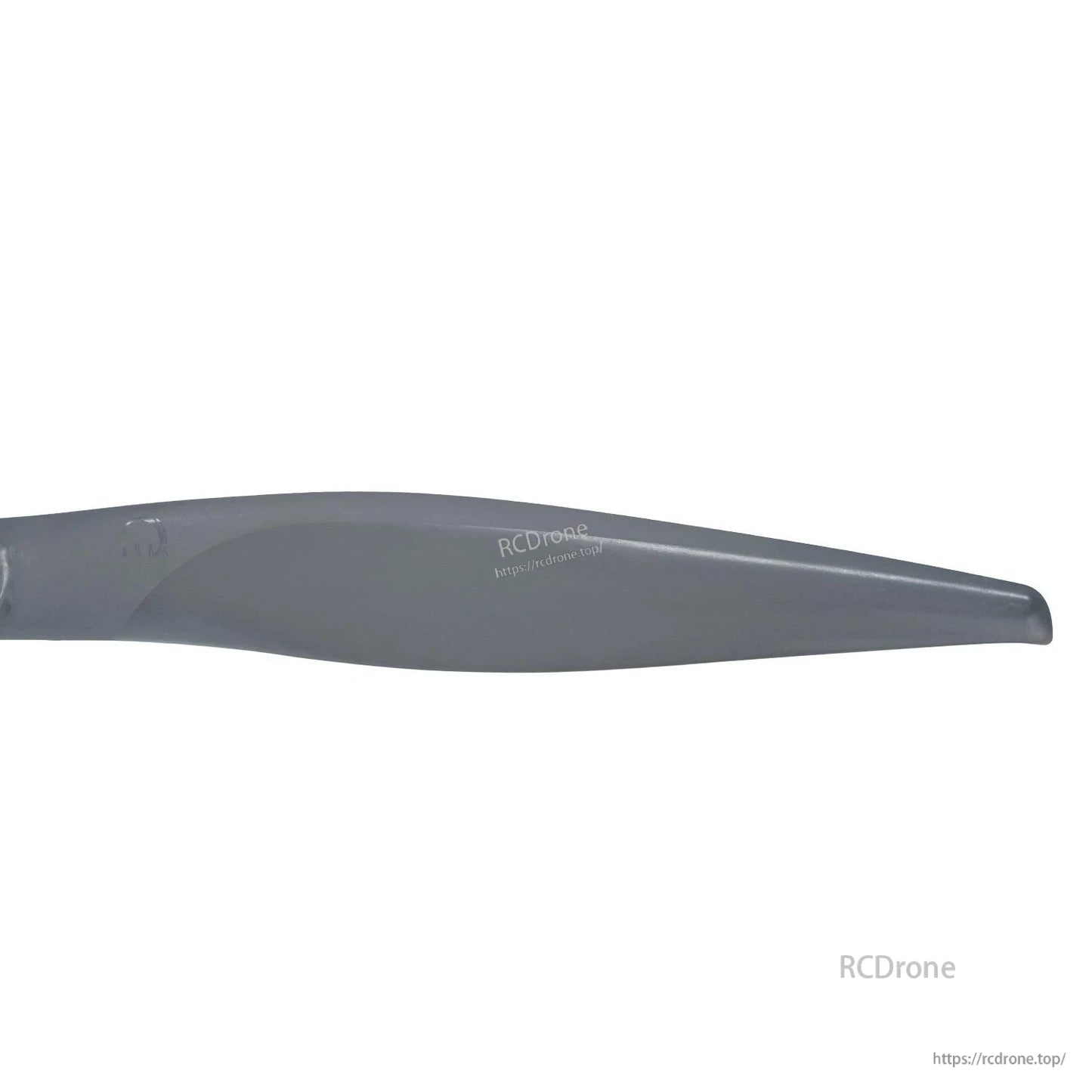 Close-up of propeller blade tip showing leading edge shape and surface finish