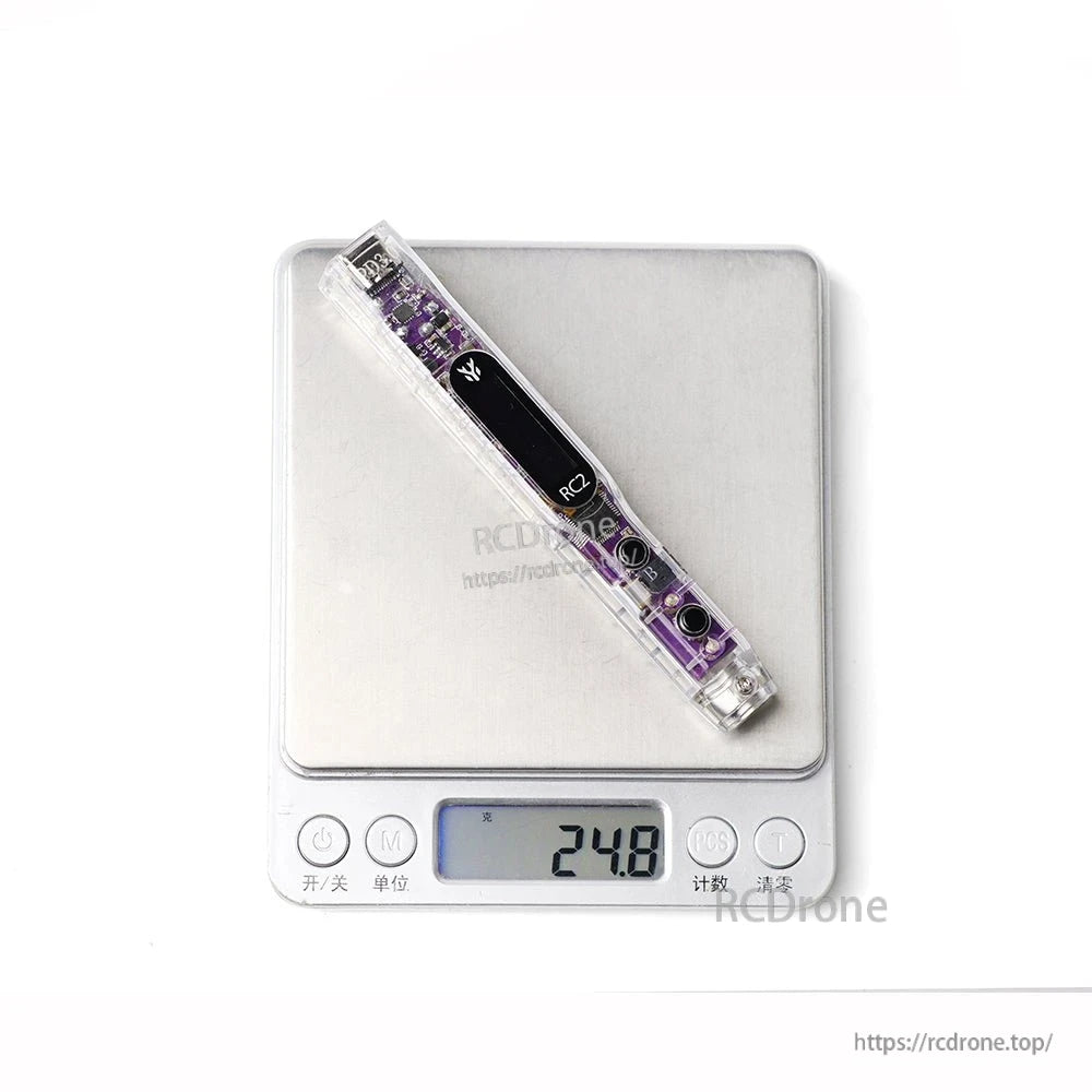 HGLRC RC2 soldering iron handle on digital scale showing 24.8 g weight reading