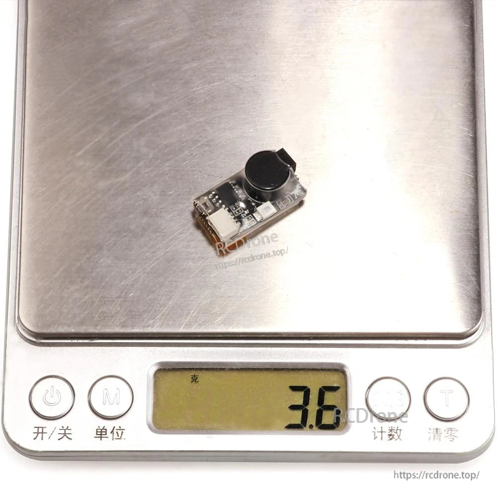 Buzzer on digital scale showing 3.6g weight reading