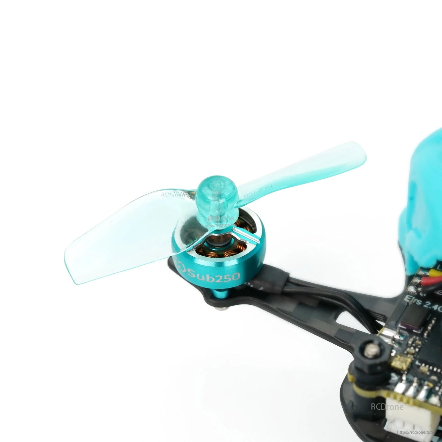 Micro drone propeller installed on motor, angled close-up showing hub fitment and blade profile