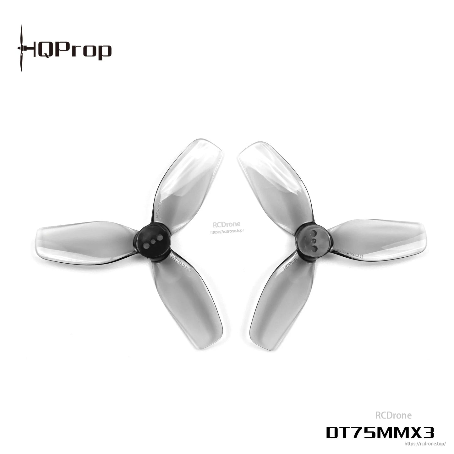Close-up pair of grey 3-blade drone propellers showing hub mounting holes and blade shape