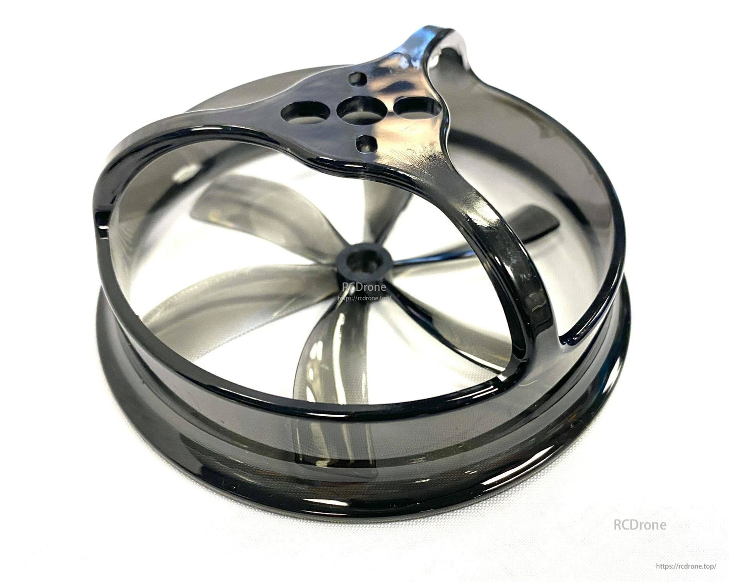 Black polycarbonate duct ring close-up with 6-blade prop visible inside, top mounting plate detail