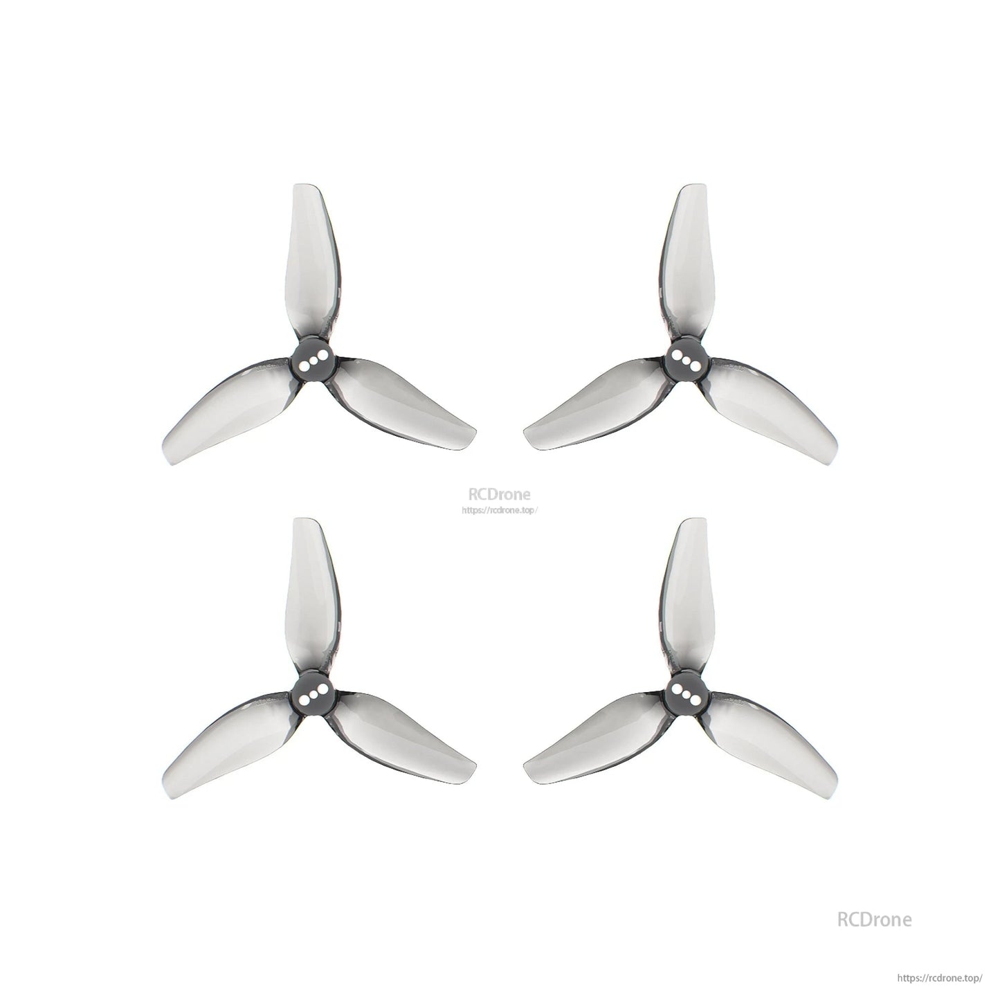 Four tri-blade propellers shown with RCDrone watermark and website URL on white background