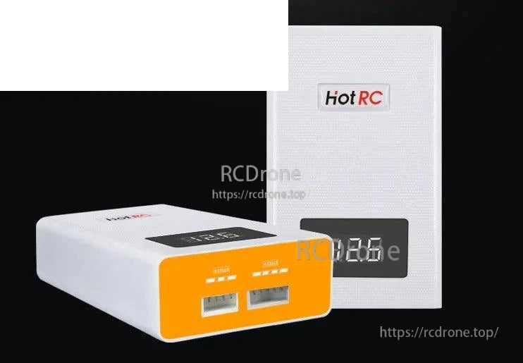 HotRC A400 charger next to retail box, digital screen lit showing 12.6 and front ports