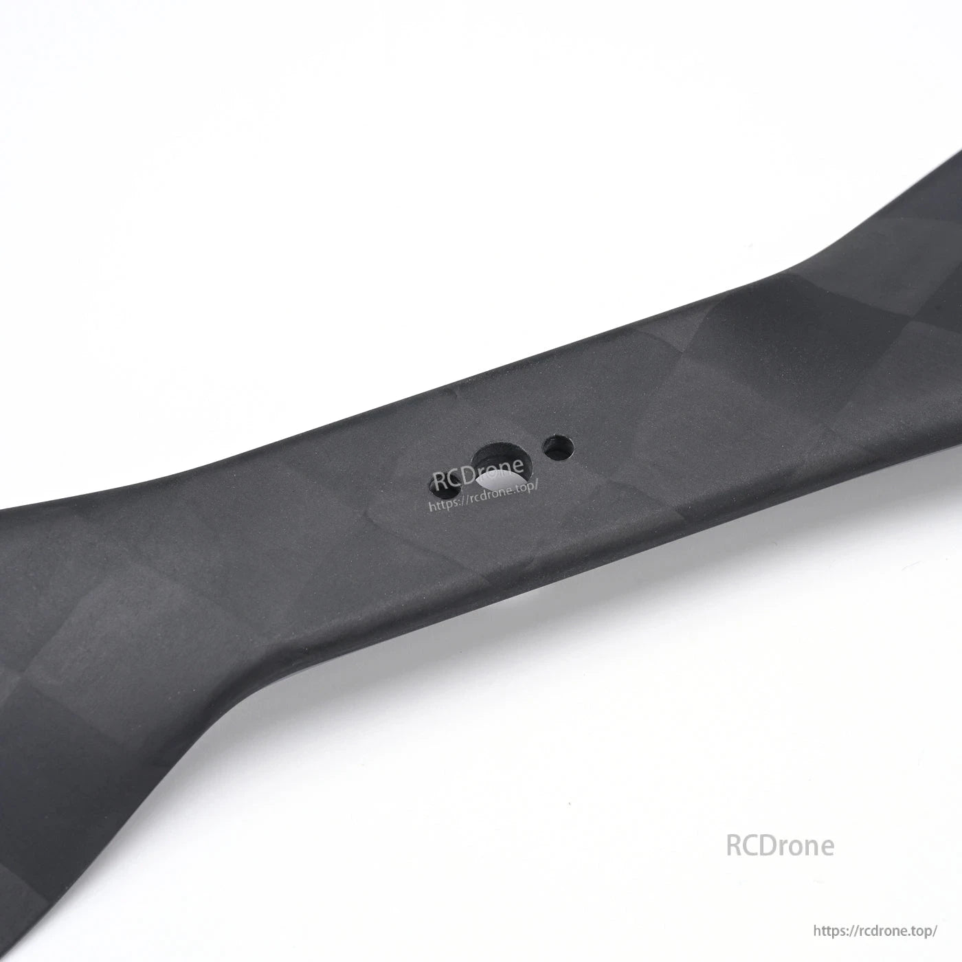 MAD CB2 PRO 18x6.1in Carbon Fiber Propeller, Close-up of MAD CB2 PRO carbon fiber propeller blade with woven finish and center mounting hole