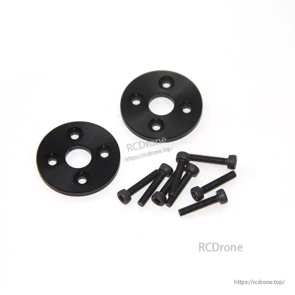 MAD FLUXER 28x9.2 Carbon Fiber Propeller, Two black round propeller mounting hub plates with multiple bolt holes and a set of hex screws