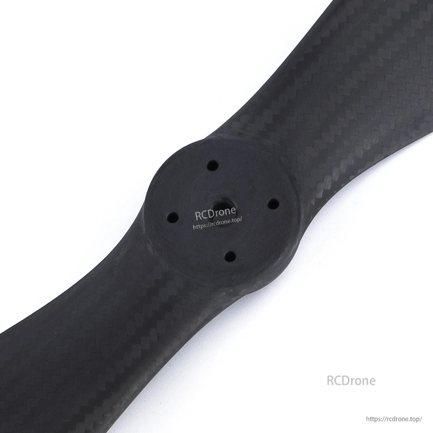 MAD FLUXER VTOL 36.1x14.4 Carbon Fiber Propeller, Close-up of MAD FLUXER VTOL carbon fiber propeller hub with multiple mounting holes and carbon weave finish