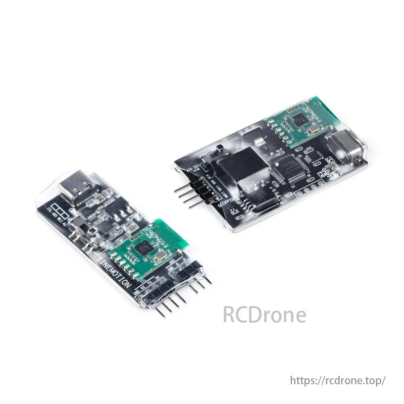 MAD FOC 60A 8-14S Drone ESC, Two electronic modules with USB ports and circuit boards are encased in transparent plastic.