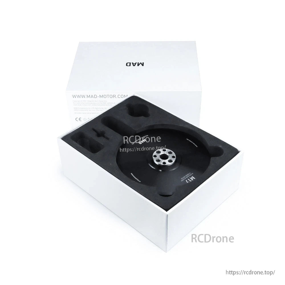 MAD M17 IPE V1.1 drone motor packaged in a white box with black foam insert and mounting hub visible