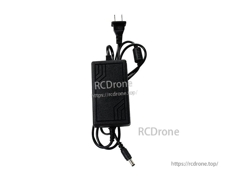 Bundled view of DC power adapter with US plug, inline ferrite bead, and barrel connector
