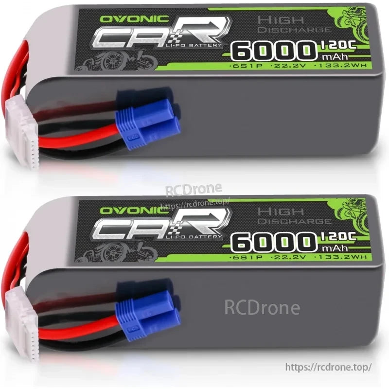 Close-up of two OVONIC 6S 6000mAh 22.2V 120C LiPo batteries showing label, EC5 connector, and balance plug