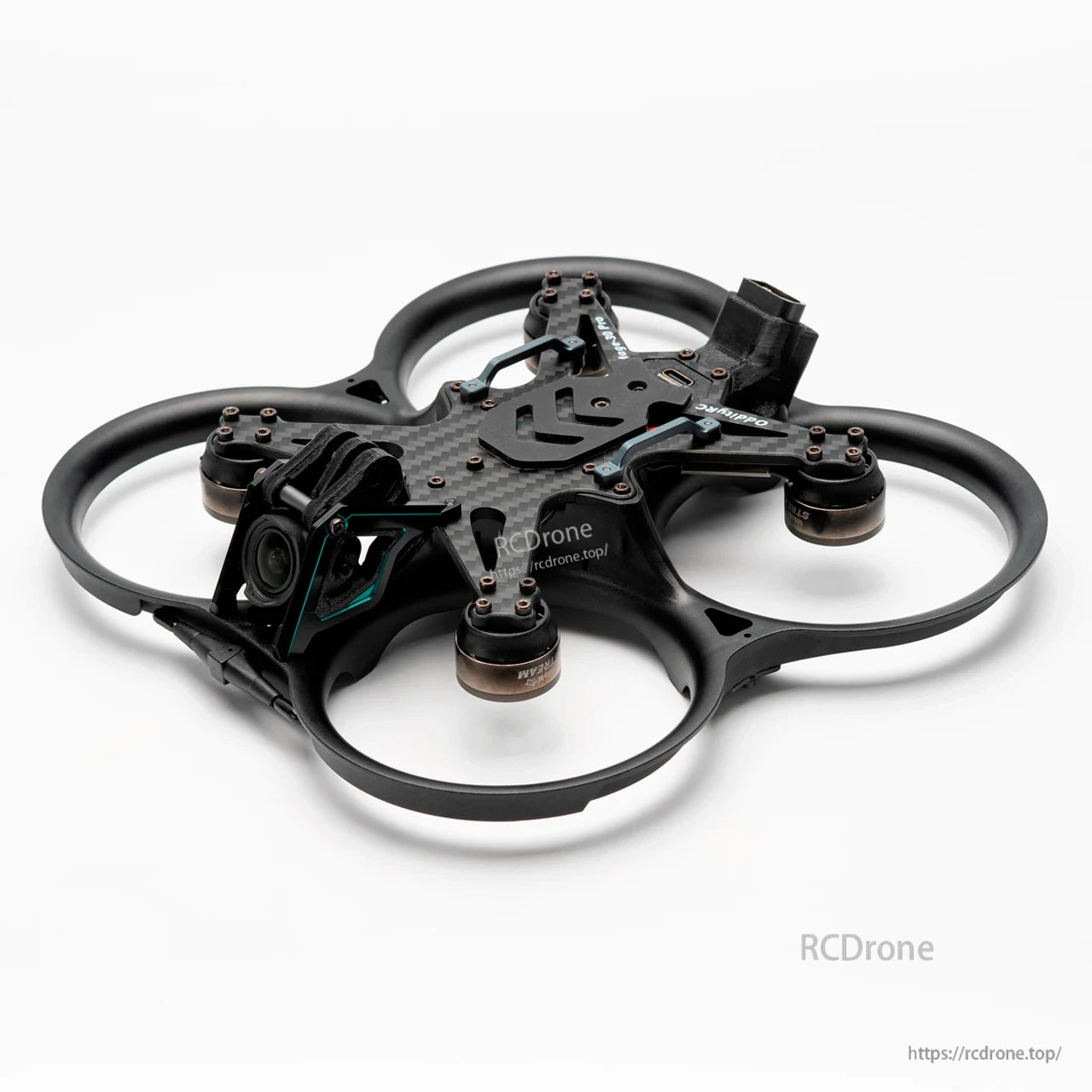 Three-quarter view of assembled ducted quad highlighting ducts, camera housing, and motor positions