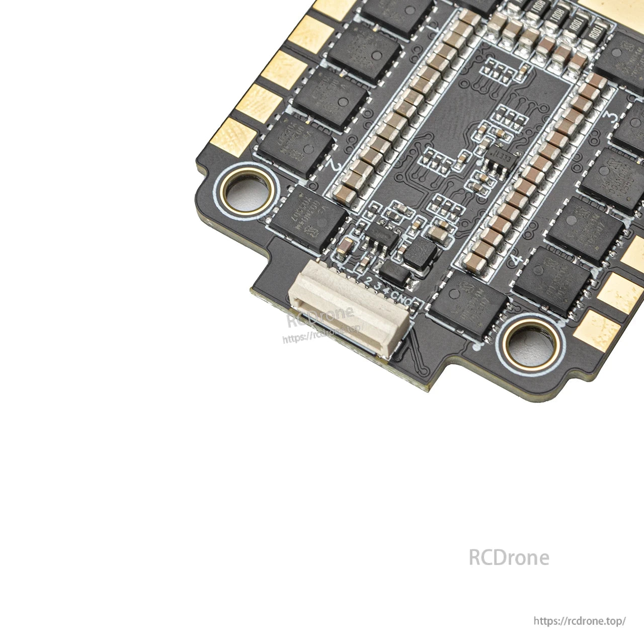 Close-up of ESC JST plug connector and adjacent solder points on the board