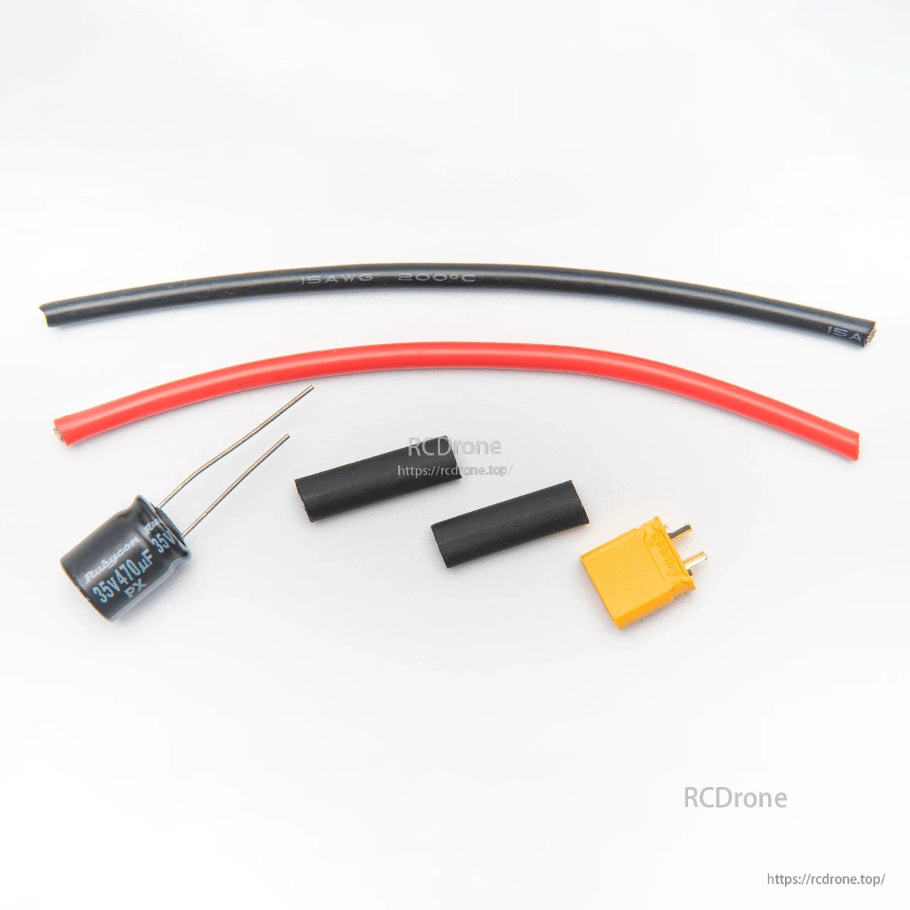 XT-style yellow connector with capacitor, heat-shrink tubes, and red/black wire leads