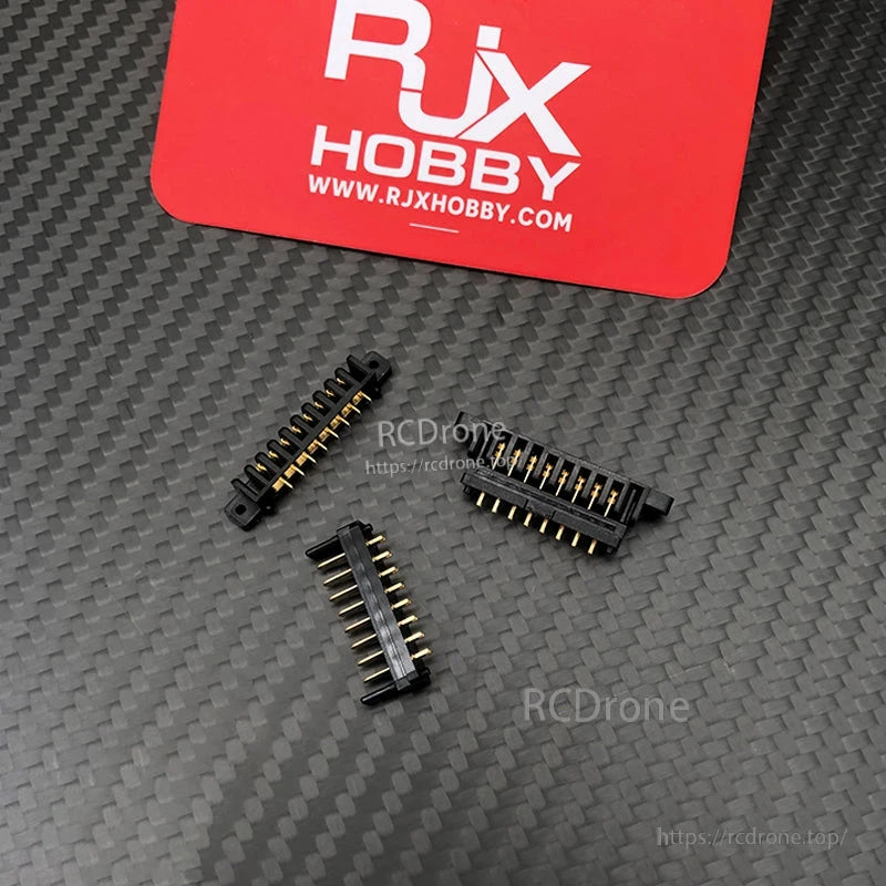 RJX 5 Pairs 8-Pin Drone Battery Connector, RJX 8-pin drone battery connector plugs with black housings and gold pins on a carbon-fiber patterned surface
