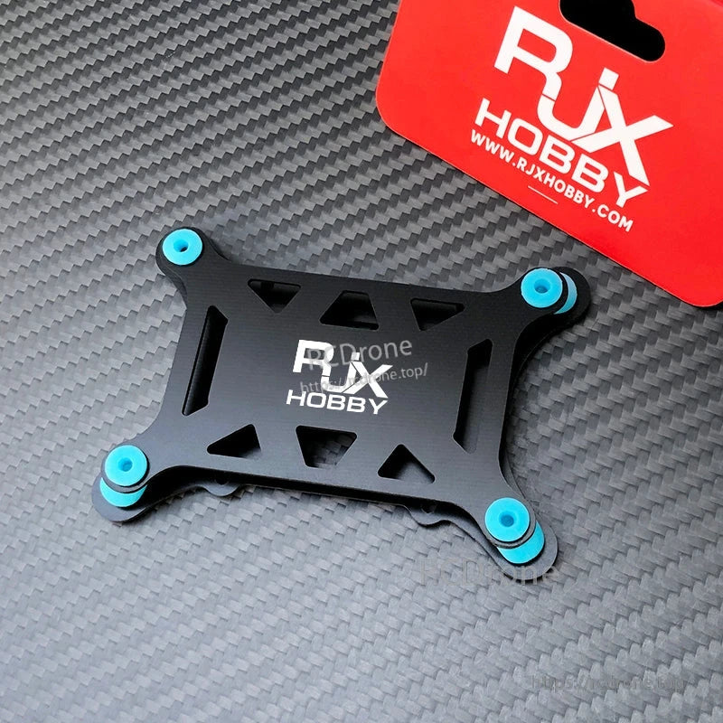 RJX Anti-Vibration Flight Controller Mount, RJX Hobby anti-vibration flight controller mount plate with four blue rubber dampers on corners