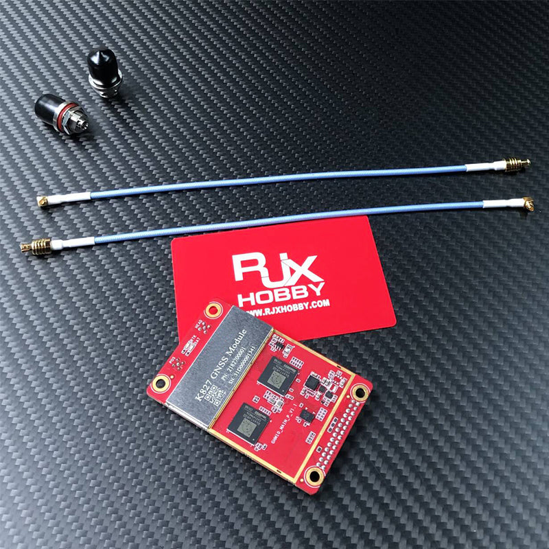RJX K827 GNSS receiver board module on red PCB with two RF coax pigtail cables and SMA connectors