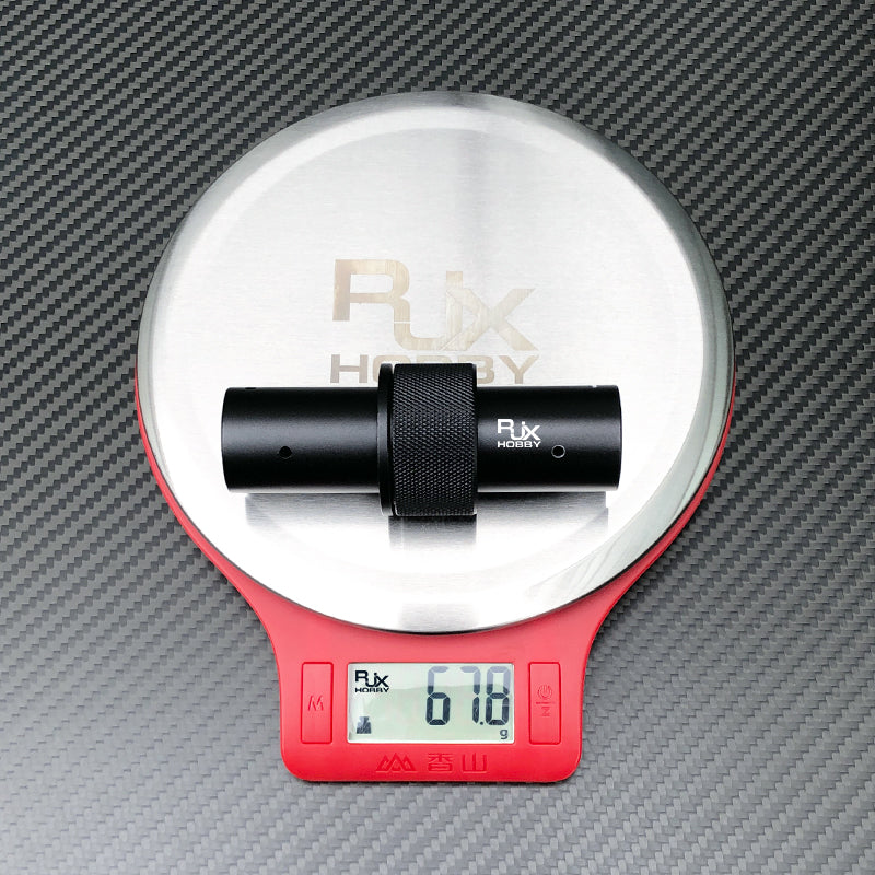 RJX 25mm aluminum alloy pipe connector on digital scale, showing 67.8 g weight