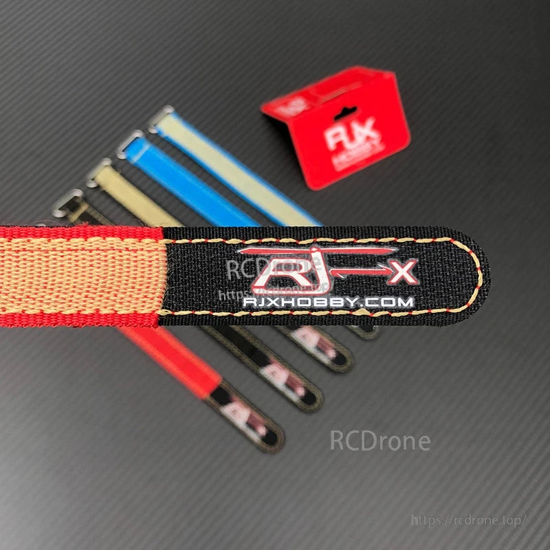 RJXHOBBY Kevlar battery strap with stitched pull tab and hook-and-loop closure, shown with multiple color options