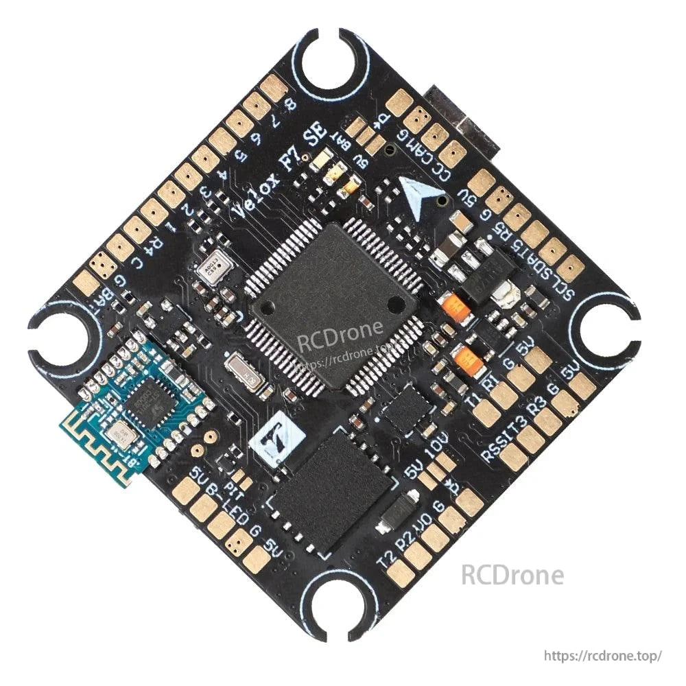 T-Motor Velox F7 SE flight controller board with integrated Bluetooth module and labeled solder pads
