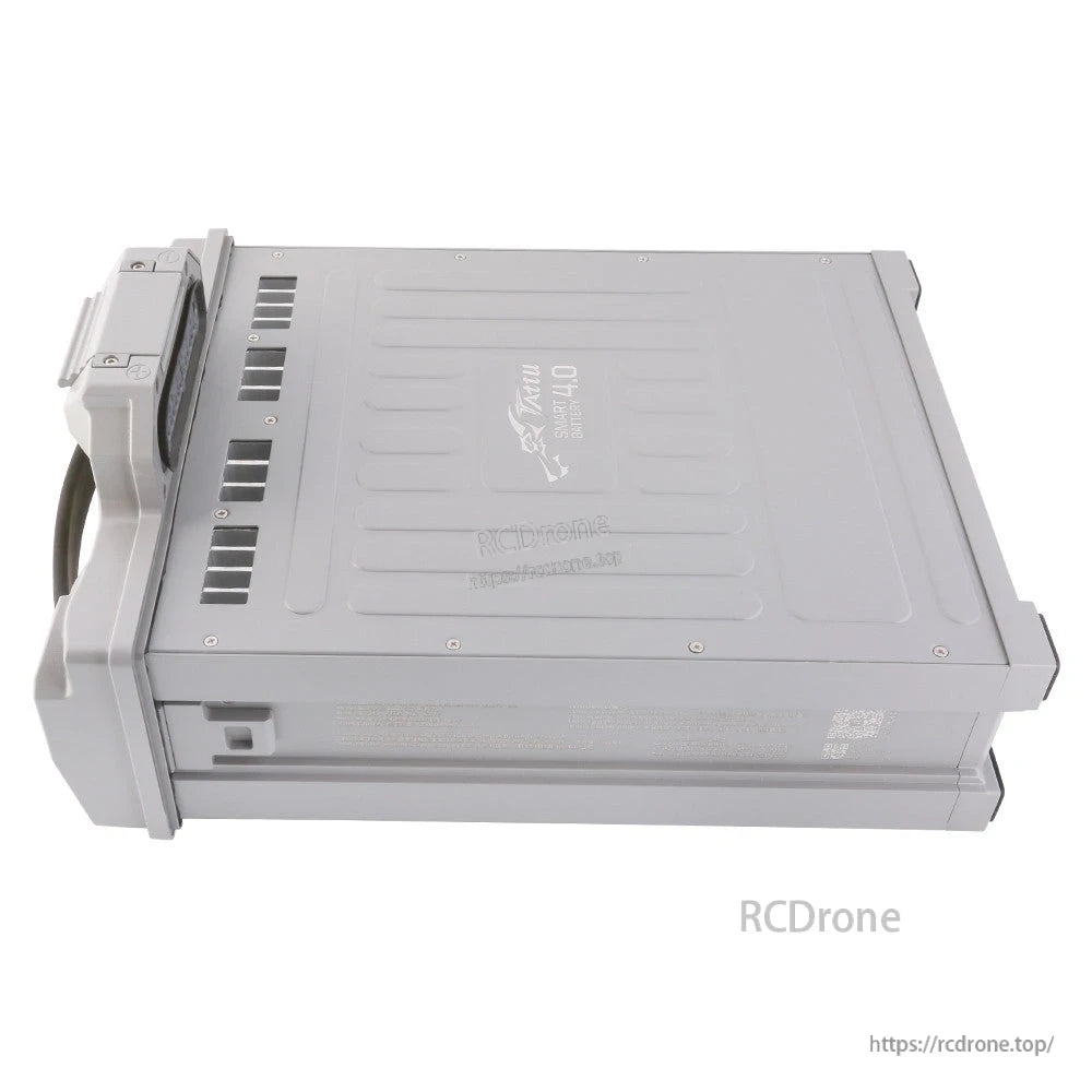 Tattu 4.0 smart LiPo battery in gray hard case with built-in handle and connector end for drone power systems