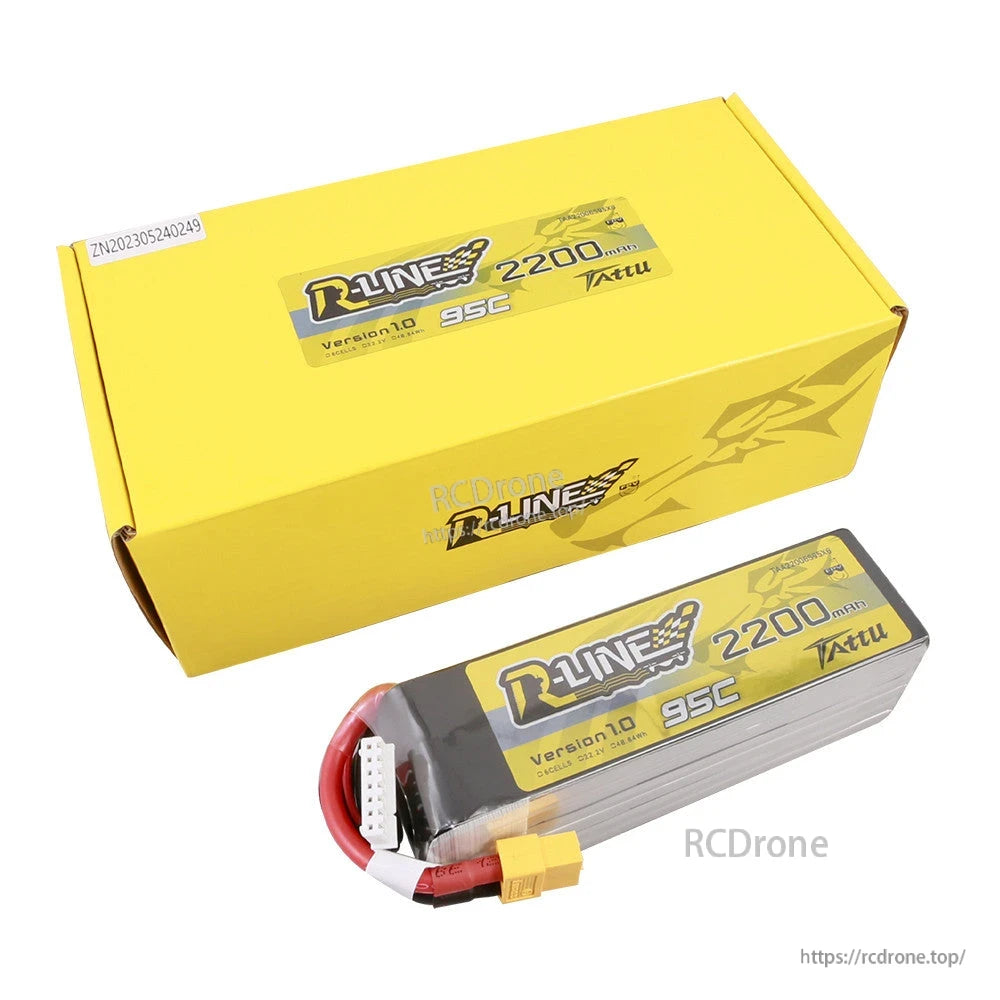 Tattu R-Line 2200mAh 6S 95C 22.2V LiPo Battery, Tattu R-Line 2200mAh 6S 95C LiPo battery with XT60 plug and balance lead beside yellow R-Line box