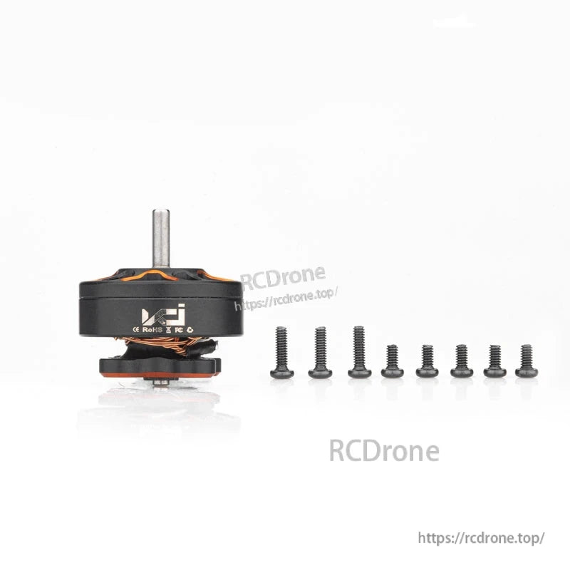 Included hardware: SPARK 1102 motor with set of mounting screws laid out on white background