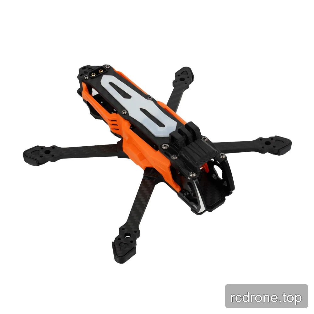 DeepSpace SEEKER35 FPV frame in orange and black, shown from an elevated rear-left angle with four carbon-fiber arms.