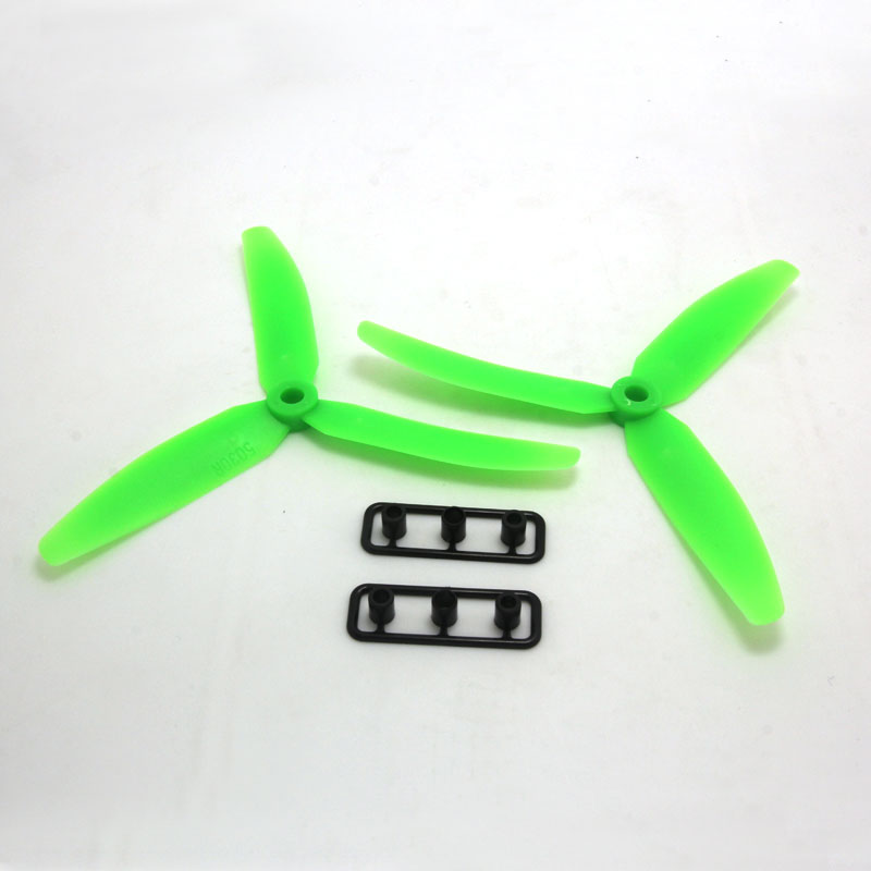 Green 3-blade propeller pair with two small mounting hardware strips on white background