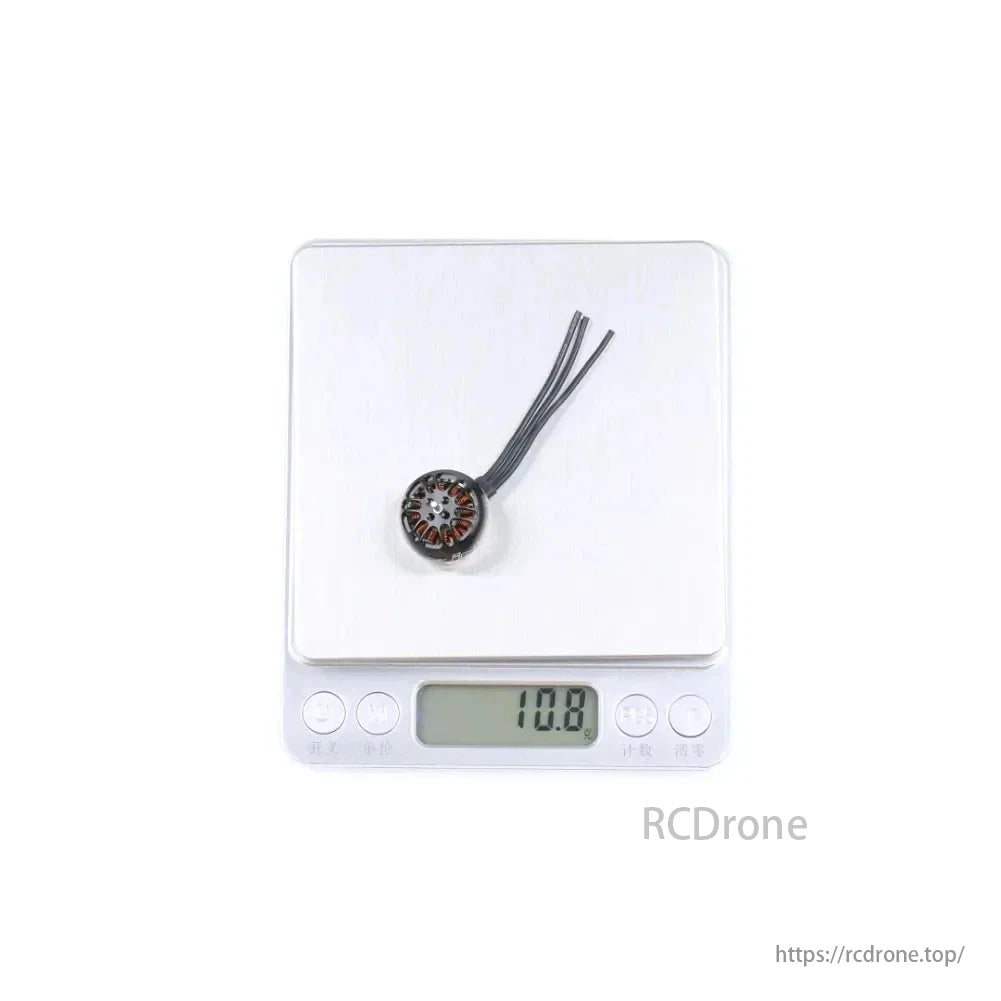 iFlight XING 1504 3100KV Brushless Motor, Brushless motor on digital scale displays weight of 10.8 grams.