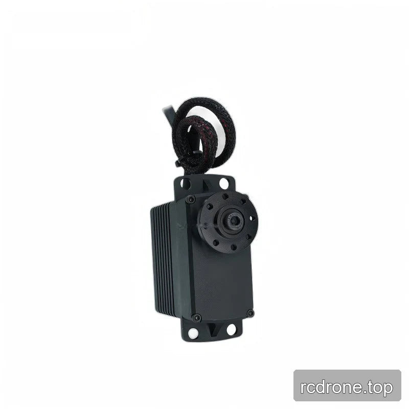 Upright servo showing the circular output flange, upper and lower mounting tabs, ribbed left side, and coiled cable above.